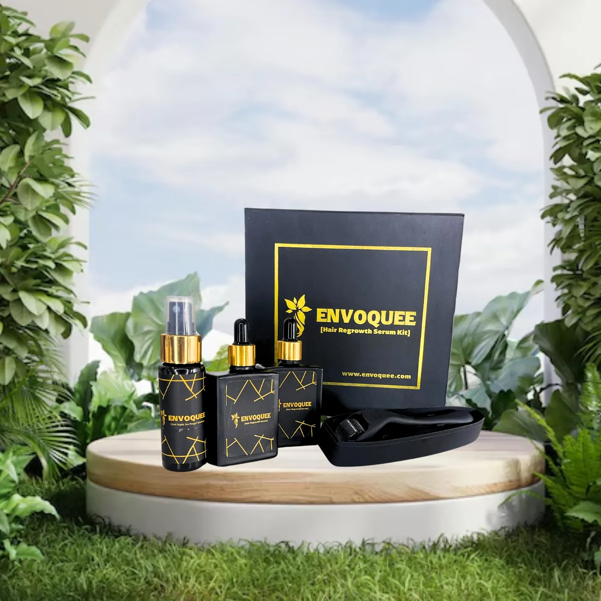 Envoquee Hair Serum Kit with gift box, two black dropper bottles, prep spray and derma roller, photographed outdoors
